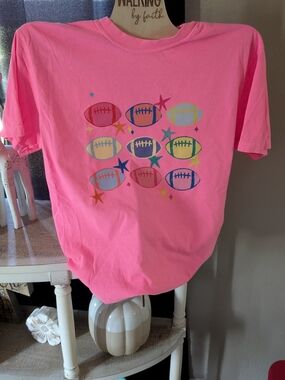 Comfort Colors Bright Pink Short Sleeve Tee with Multicolor Football Graphic